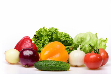 tomatoes, peppers, leafy vegetables, lettuce leaf with cucumber and onion