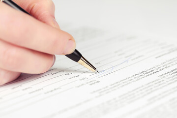 Business woman signing contract