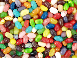 Fototapeta na wymiar pile of colorful sweet candy, many colors of tiny oval candy for background