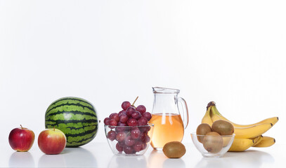 Group of fruits and juice, isolated on white