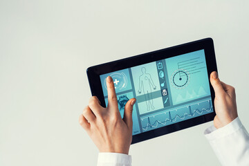 Close of female doctor hands working with tablet pc computer