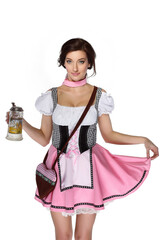 Young sexy waitress Oktoberfest dressed in traditional Bavarian dress, serves large beer mugs on a white background.