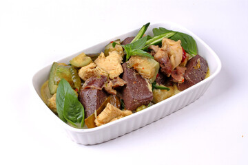 Green chicken curry in coconut milk with long eggplant .