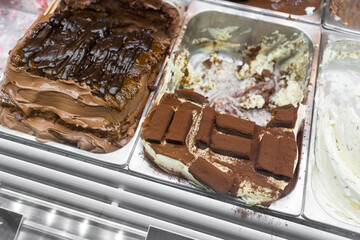 various flavors of gelato in italy. Creamy Italian ice cream in shop window