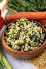 Tabbouleh salad with bulgur, parsley and vegetables -diet concep
