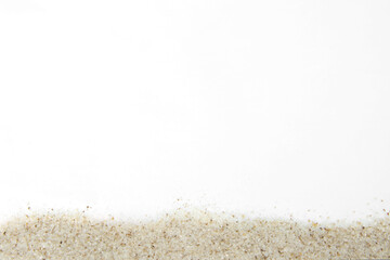 Beach sand on white background