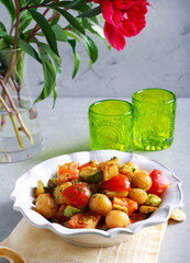 Zucchini, potato and tomato warm salad