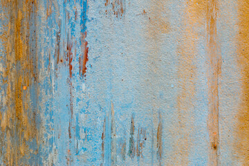 A background of peeling paint and rusty old metal