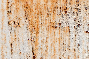 A background of peeling paint and rusty old metal