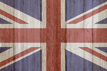 Fototapeta premium A rustic old British flag on weathered wood