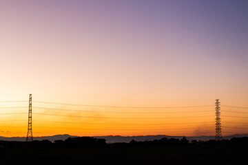 Fototapeta premium silhouette of high voltage electrical pole structure