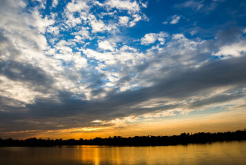 colorful dramatic sky with cloud at sunset