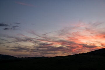 Sunset on meadow with hills and tree. Slovakia