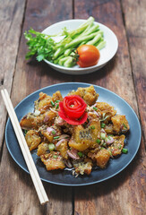 Fried spicy fish with vegetable