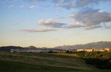 Fototapeta premium Sunset on meadow with hills and tree. Slovakia