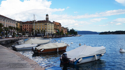 Fototapeta na wymiar Garda lake front Lungolago Zanardelli with boats moored, Salo, Italy 
