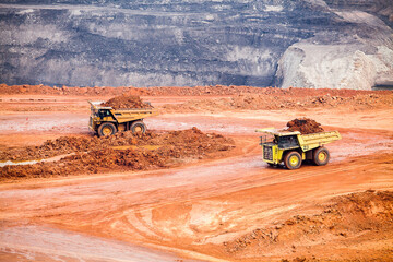 Part of a pit with big mining truck working