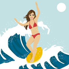 Beautiful young woman surfing on ocean waves. Blue ocean water crashing with splashes and drops