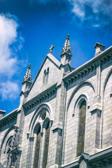 Obraz premium Basilica of our Lady of the Rosary against the sky. Lourdes, France, Hautes Pyrenees