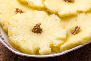 Pineapple slices in a dish