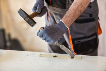 Carpenter restores old door