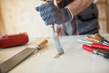 Carpenter restores old door