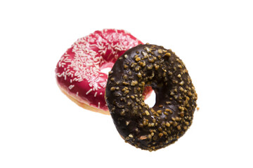 Isolated doughnuts with colorful chocolate glazing.