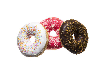 Isolated doughnuts with colorful chocolate glazing.