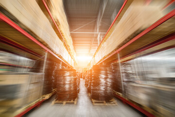 Long shelves with a variety of boxes and containers.