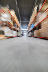 Long shelves with a variety of boxes and containers.