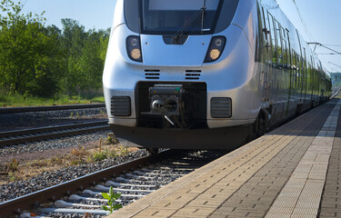 Fototapeta premium activism,train, transport, road, railway, rails, sleepers, embankment, movement, journey, way, trip, activity, communication, composition, locomotive, cars, passenger, salon, speed, fast, convenient, 