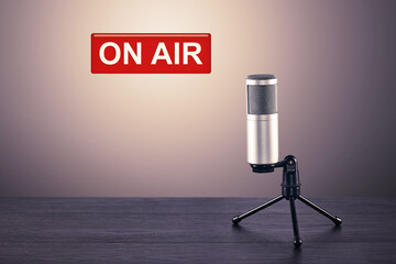 Microphone on table in front wall background on air