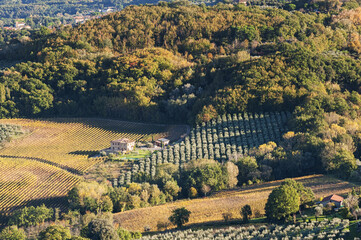 MONTEPULCIANO - TUSCANY/ITALY, OCTOBER 29, 2016:  An idyllic landscape large view over Montepulciano countryside, as seen from the town's top, bathed in the autumn sunset light 