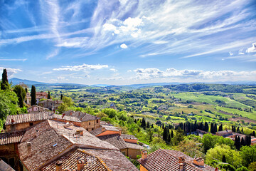 View over the Tuscan countryside and the town of Montepulciano, Italy - obrazy, fototapety, plakaty