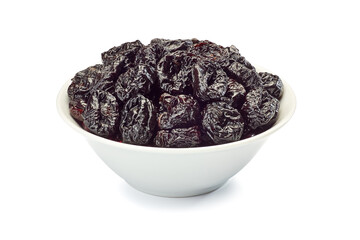 Bowl of dried plums on white
