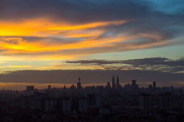 Silhouette of downtown Kuala Lumpur during majestic sunset 