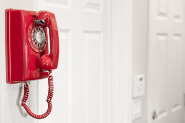 Red retro rotary wall phone