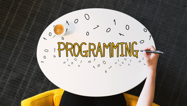 Programming text on a white table