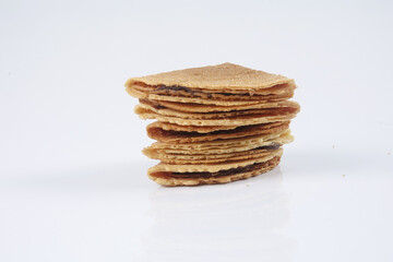 Kuih Kapit or the Love Letter biscuit over white background