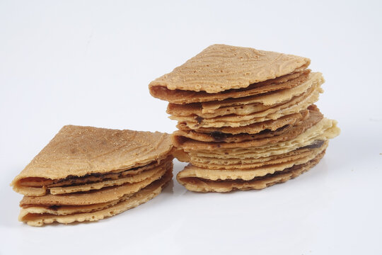 Kuih Kapit or the Love Letter biscuit over white background