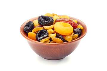 Bowl of dried fruits mix on white