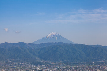 Fototapeta na wymiar Mount Fuji and Kofu city in spring season