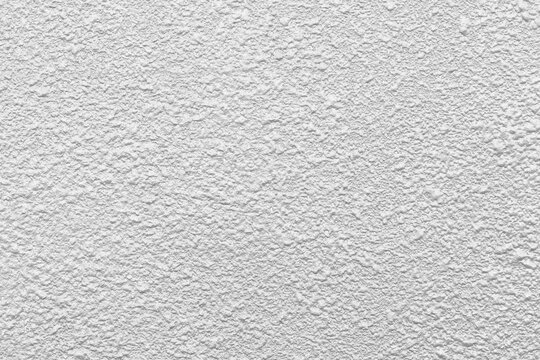 The modern white concrete tile wall background..