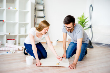 Couple renovating apartment