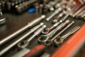 nuts bolts screws and tools in a box