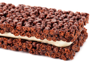 Delicious and healthy chocolate bar with muesli and cream