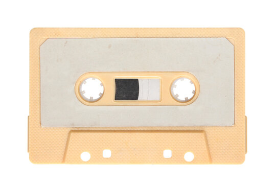 Yellow audio cassette isolated on background