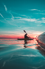 side view on kayak and a kayake