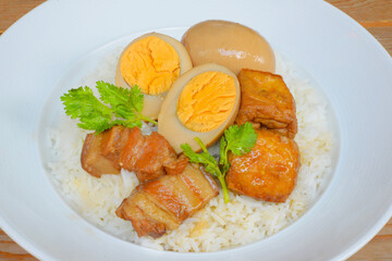 Rice and egg and pork in brown sauce,Thai food
