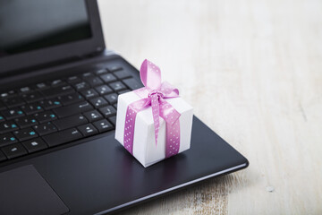 Gift box on a laptop.